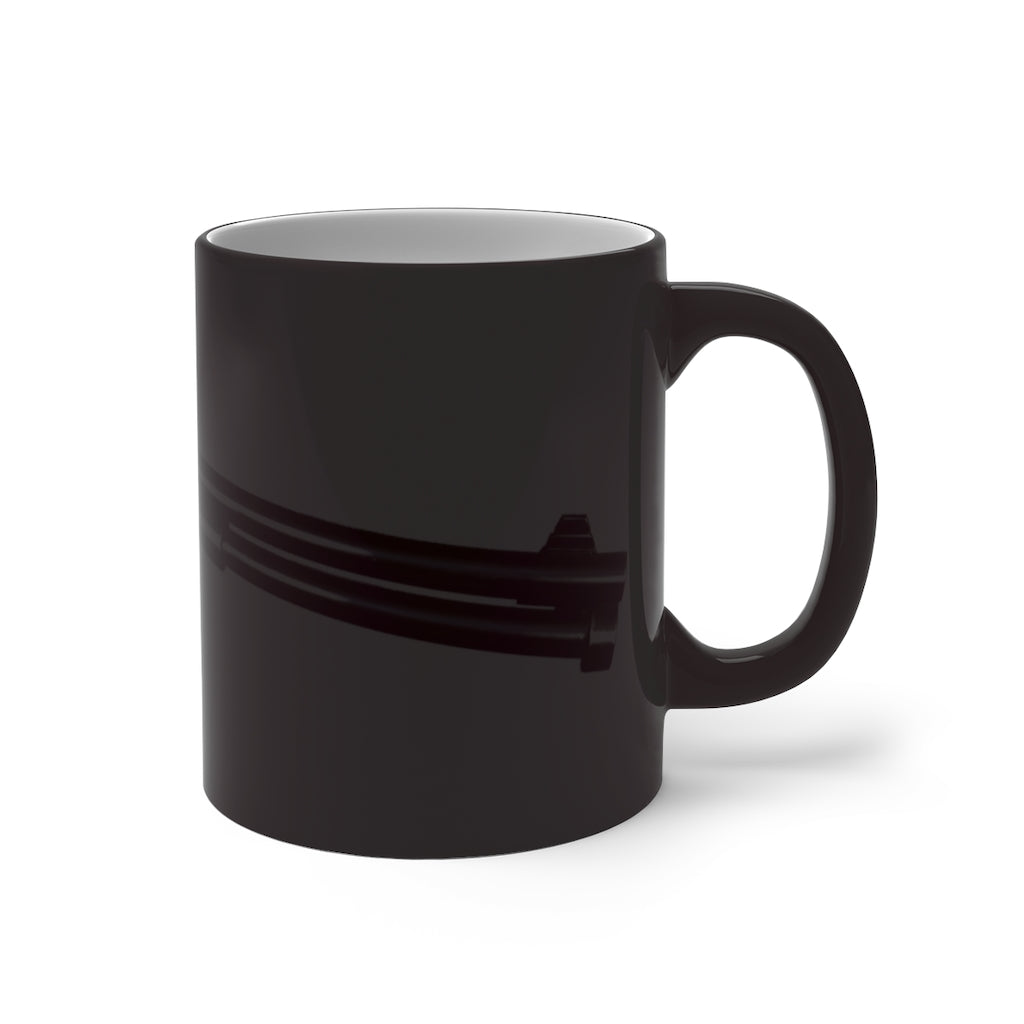 Shotgun Color Changing Mug showcasing its vibrant color transformation when filled with a hot beverage, featuring a C-handle and rounded corners.