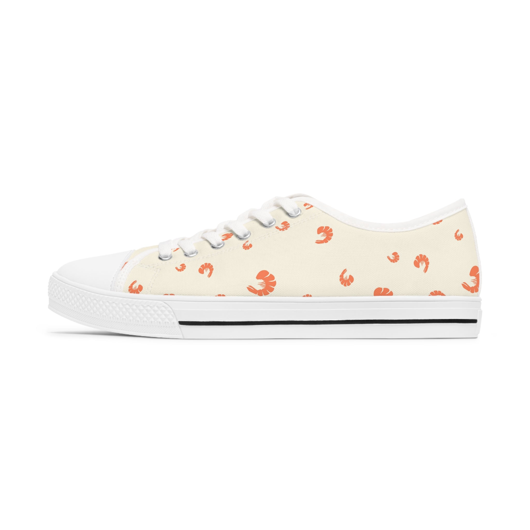 A pair of stylish Shrimp Women's Low Top Sneakers in black and white, featuring breathable canvas and memory foam insoles.