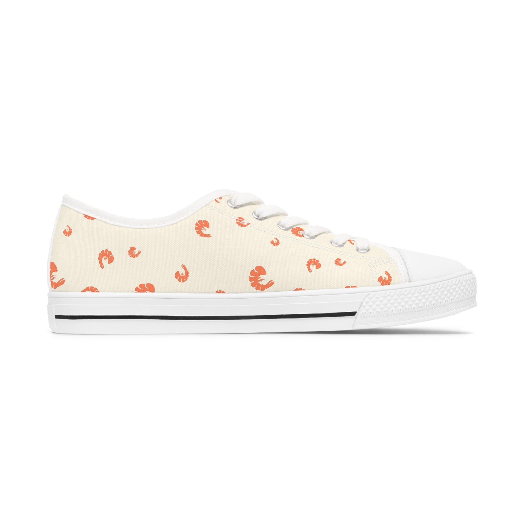 A pair of stylish Shrimp Women's Low Top Sneakers in black and white, featuring breathable canvas and memory foam insoles.