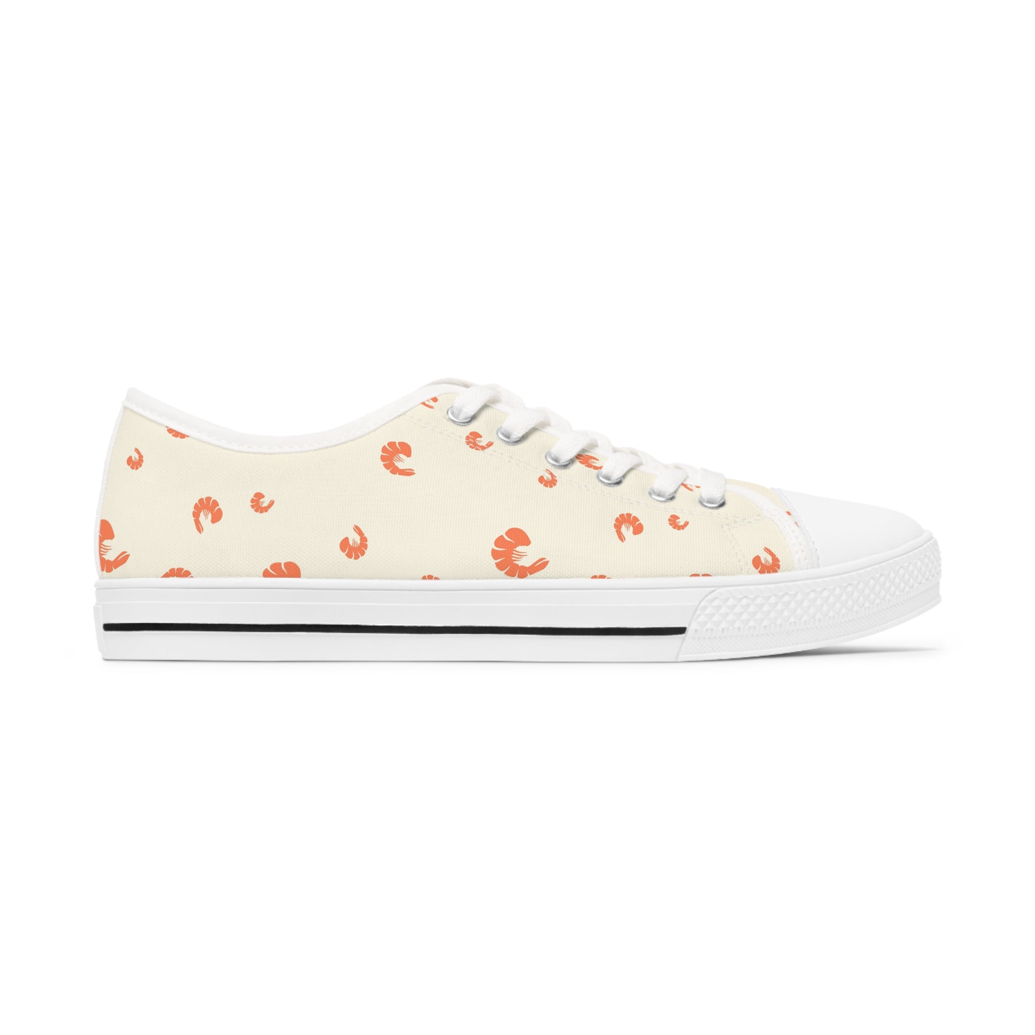 A pair of stylish Shrimp Women's Low Top Sneakers in black and white, featuring breathable canvas and memory foam insoles.