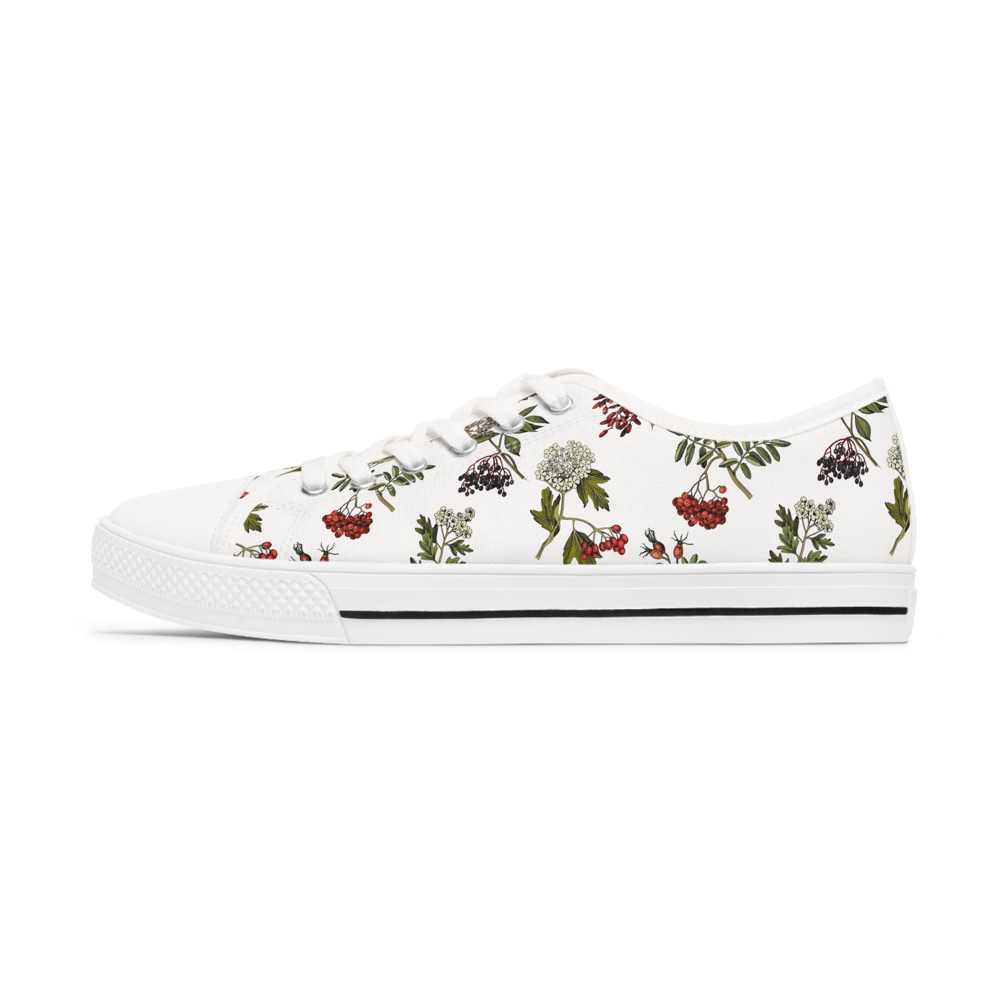 A pair of Shrub Women's Low Top Sneakers in black and white, showcasing breathable polyester canvas and stylish PU leather decoration.