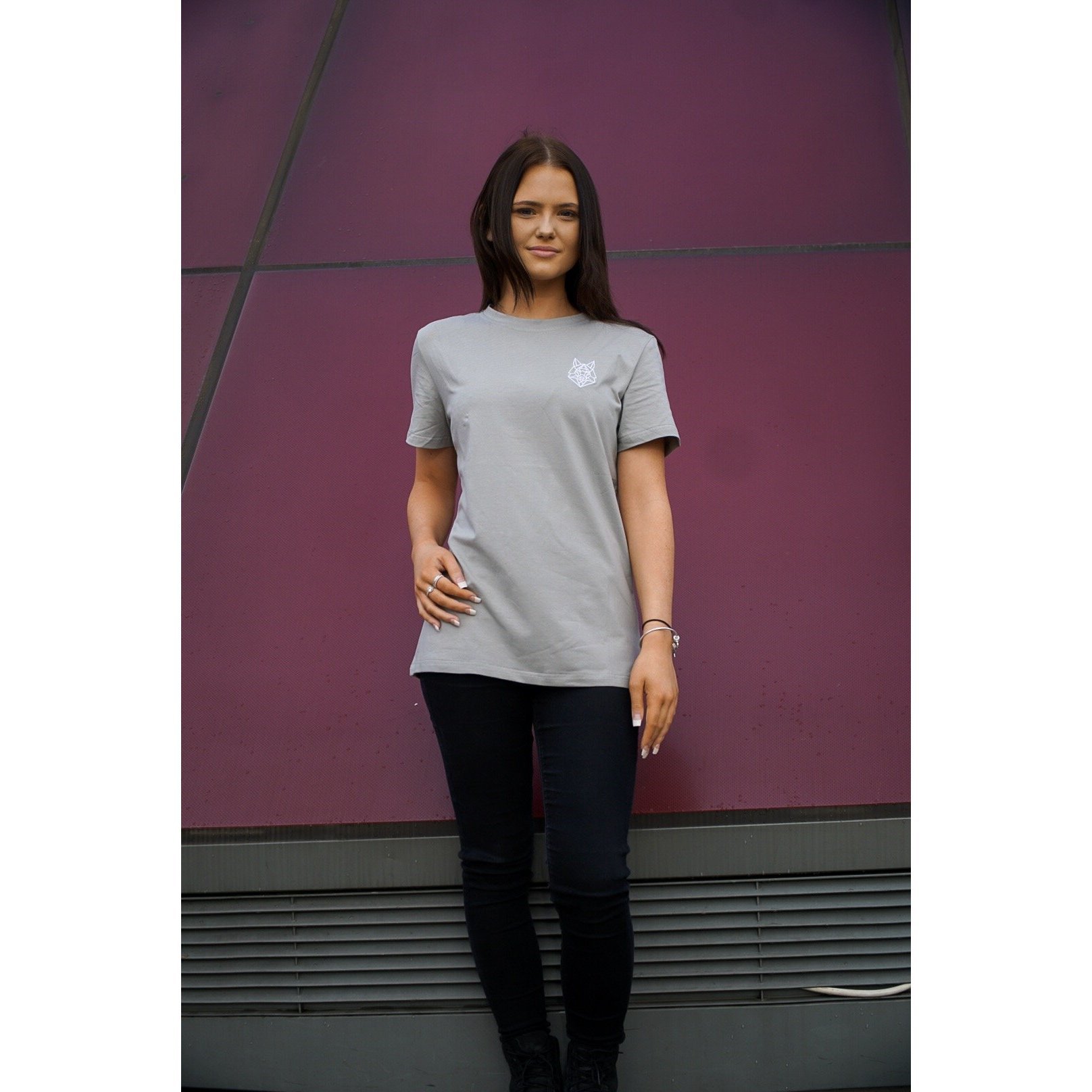 A fitted grey t-shirt featuring a white embroidered Wolfe logo on the left chest, made from a soft cotton and spandex blend.