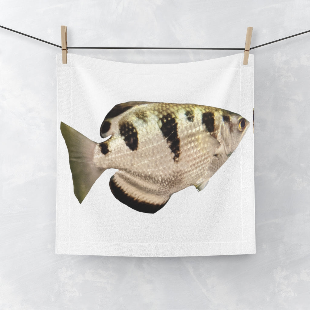 A stylish Silver and Black Fish Face Towel featuring a vibrant fish design on a polyester front and soft cotton back, perfect for personal use or gifting.