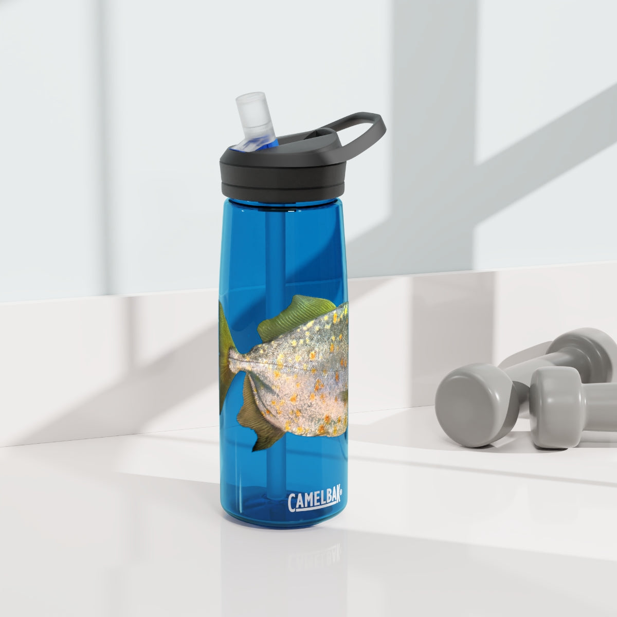 Silver and Spec Fish CamelBak Eddy® Water Bottle in 20oz and 25oz sizes, showcasing its durable Tritan™ material and spill-proof design.