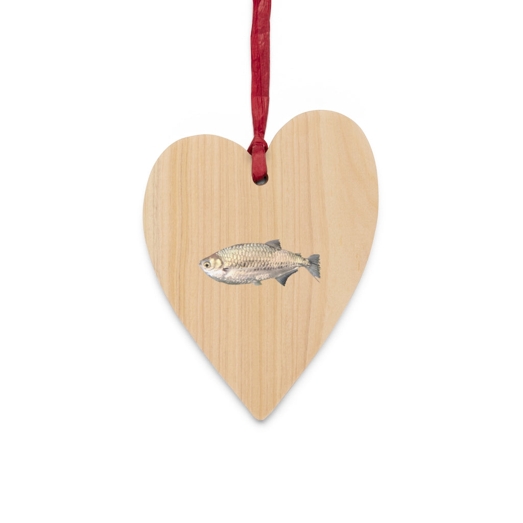 A collection of Silver Fish Wooden Christmas Ornaments in various whimsical shapes, featuring a rustic wood finish and red ribbons for hanging.