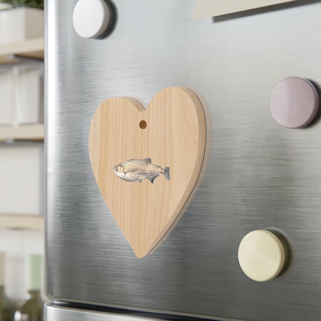 A collection of Silver Fish Wooden Christmas Ornaments in various whimsical shapes, featuring a rustic wood finish and red ribbons for hanging.