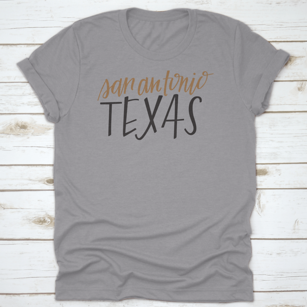 A stylish Simple Hand-Lettered Vector Of San Antonio Texas Shirt showcasing a unique design, made from high-quality cotton fabric.