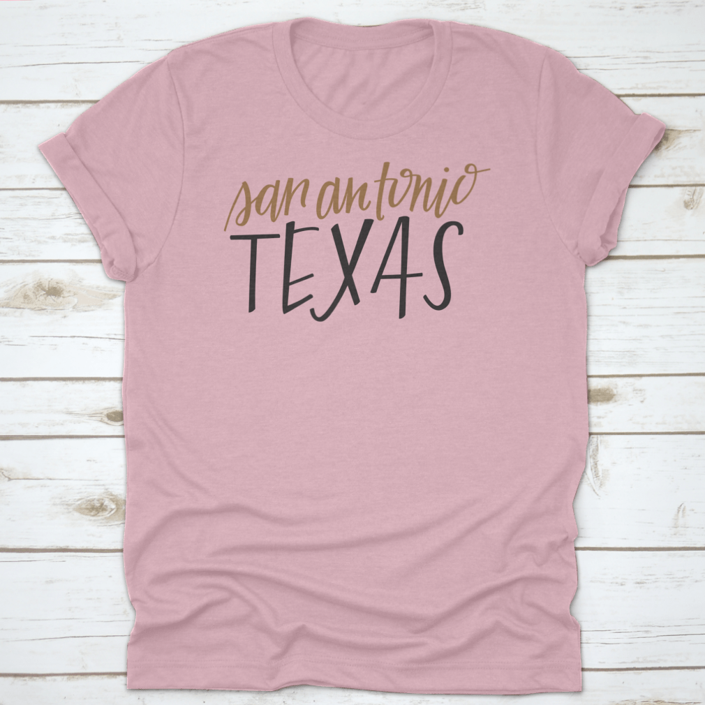 A stylish Simple Hand-Lettered Vector Of San Antonio Texas Shirt showcasing a unique design, made from high-quality cotton fabric.