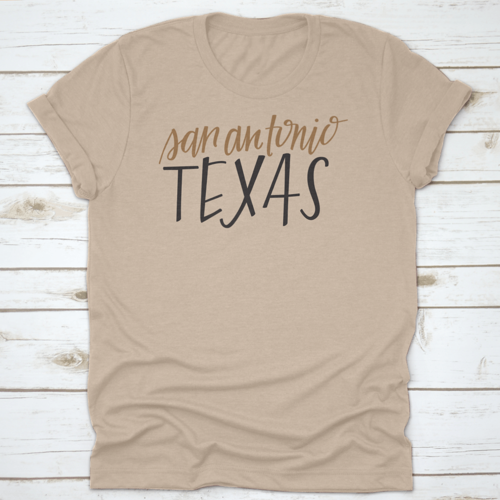 A stylish Simple Hand-Lettered Vector Of San Antonio Texas Shirt showcasing a unique design, made from high-quality cotton fabric.