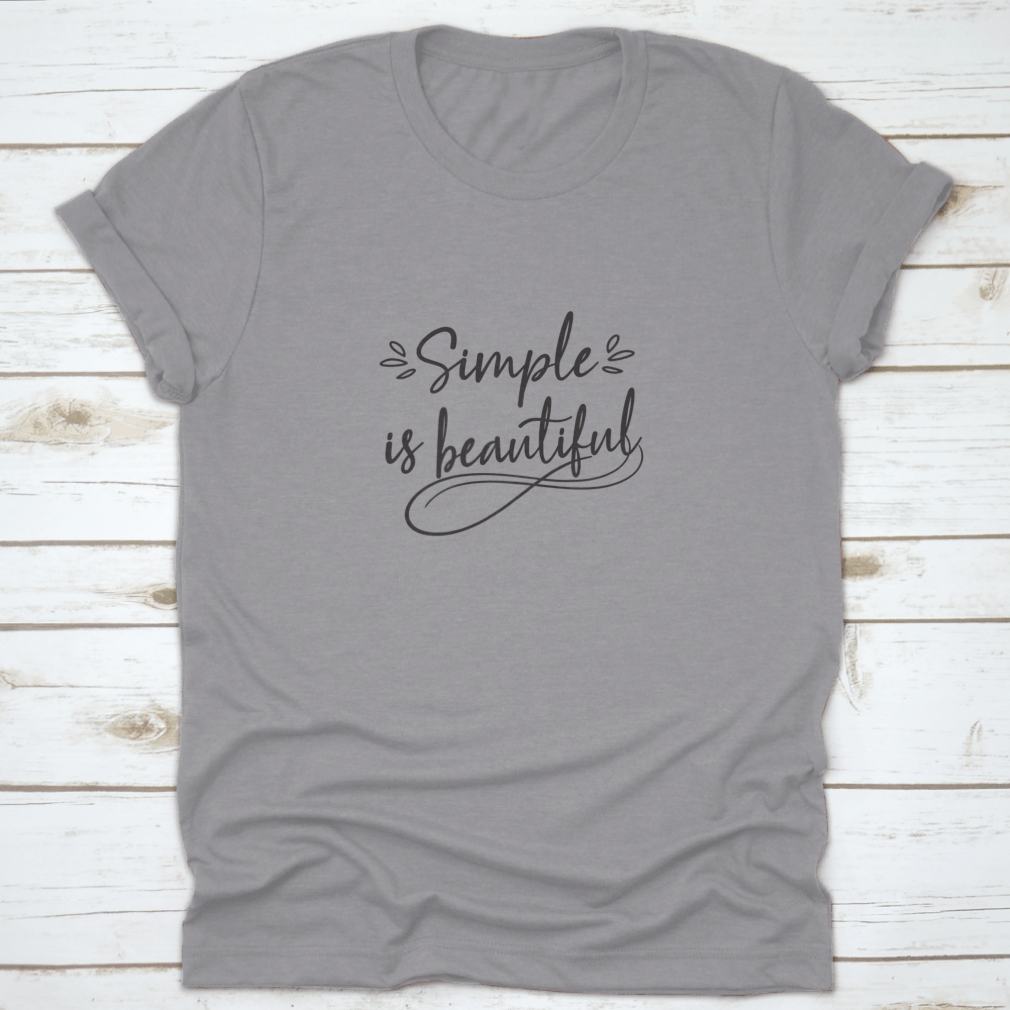 A stylish hand-drawn tee design featuring the phrase 'Simple Is Beautiful', made from 100% cotton, showcasing a classic fit.