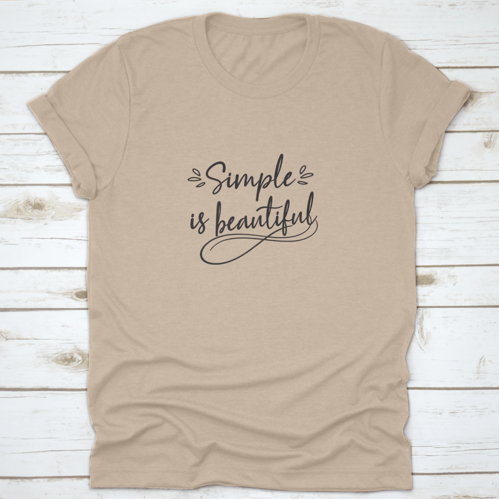 A stylish hand-drawn tee design featuring the phrase 'Simple Is Beautiful', made from 100% cotton, showcasing a classic fit.