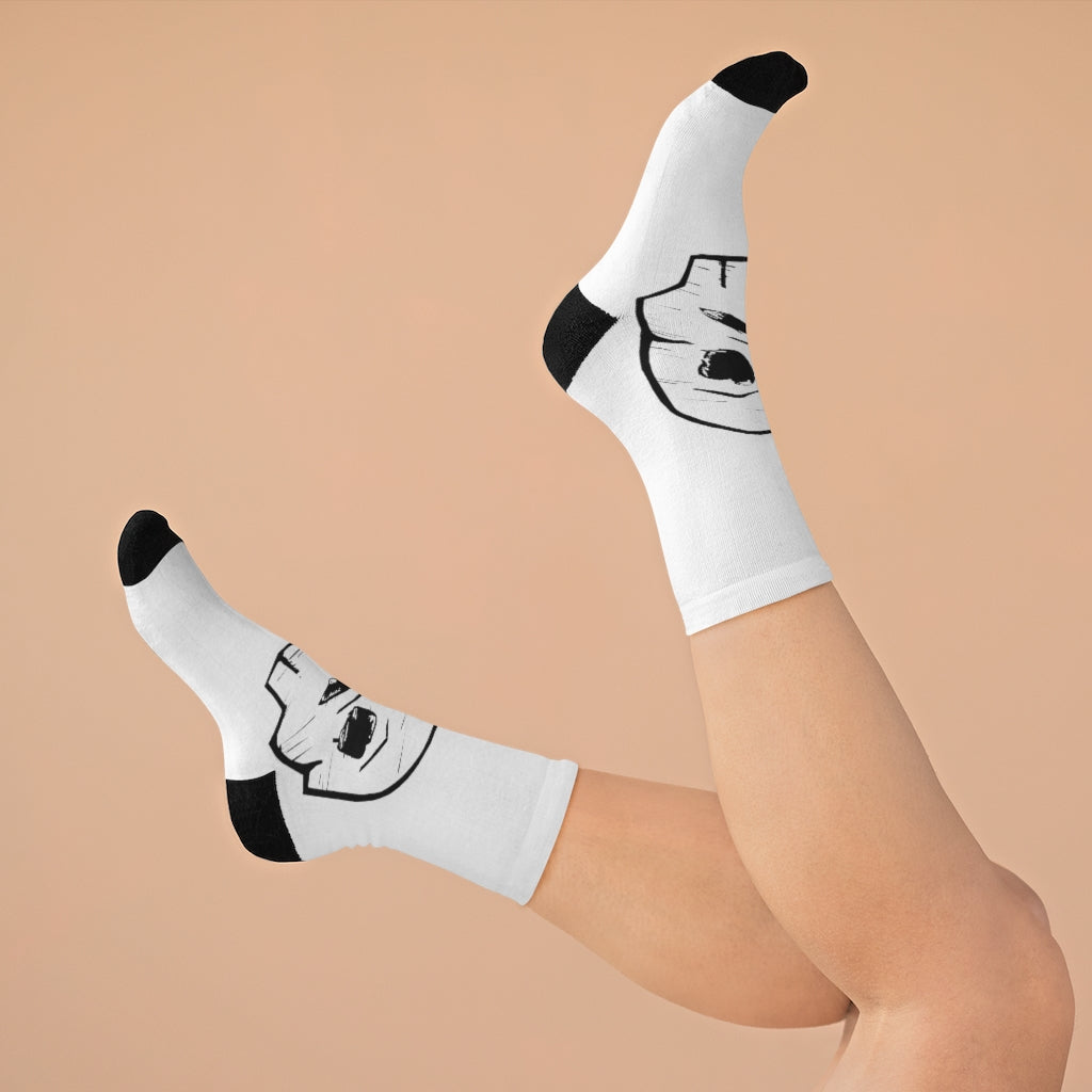 A pair of Skeleton DTG Socks featuring a stylish skeleton design, made from a blend of recycled materials for comfort and durability.