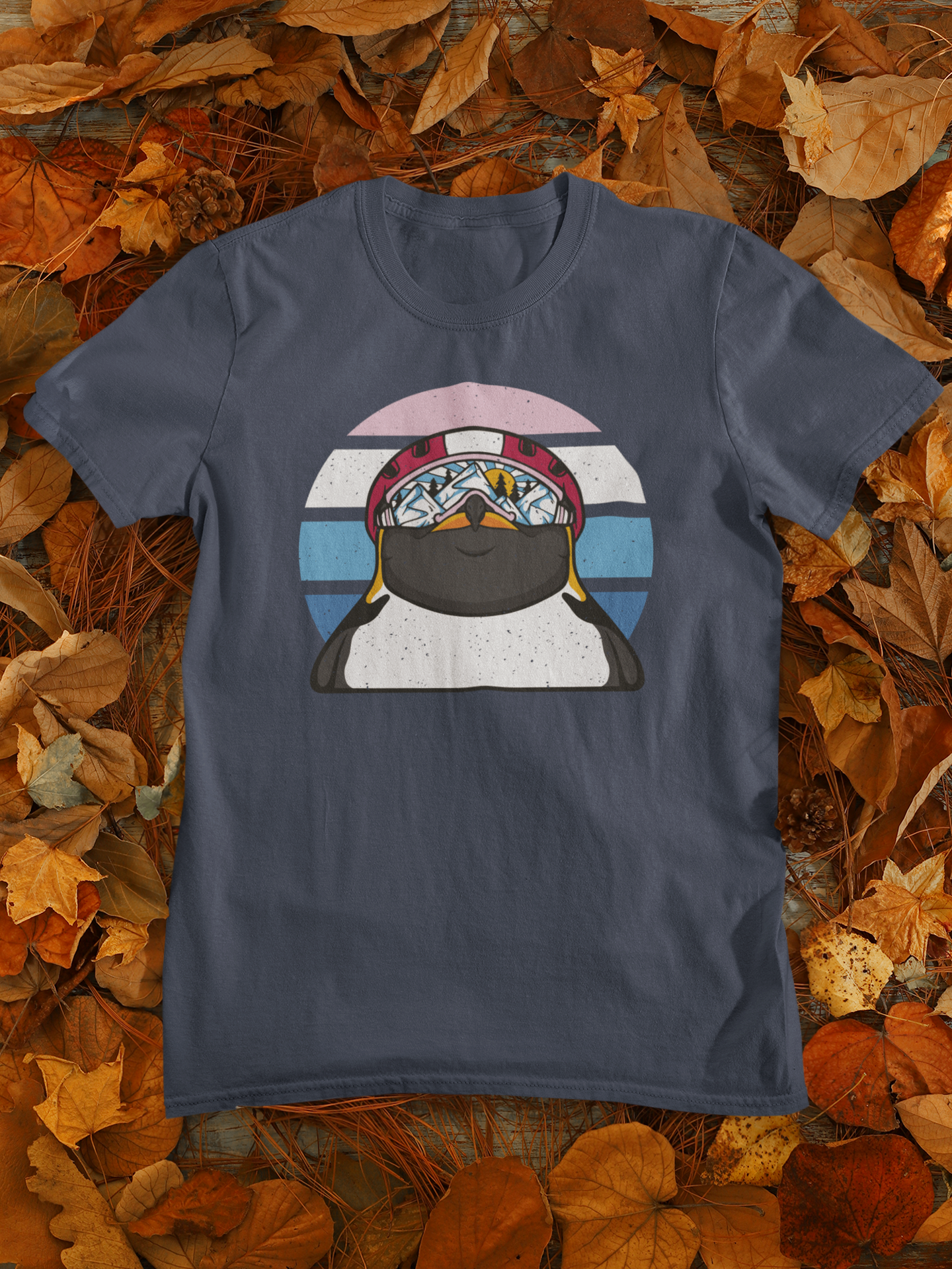 A stylish Ski Penguin T-shirt featuring a cute penguin dressed in ski attire, perfect for winter enthusiasts.