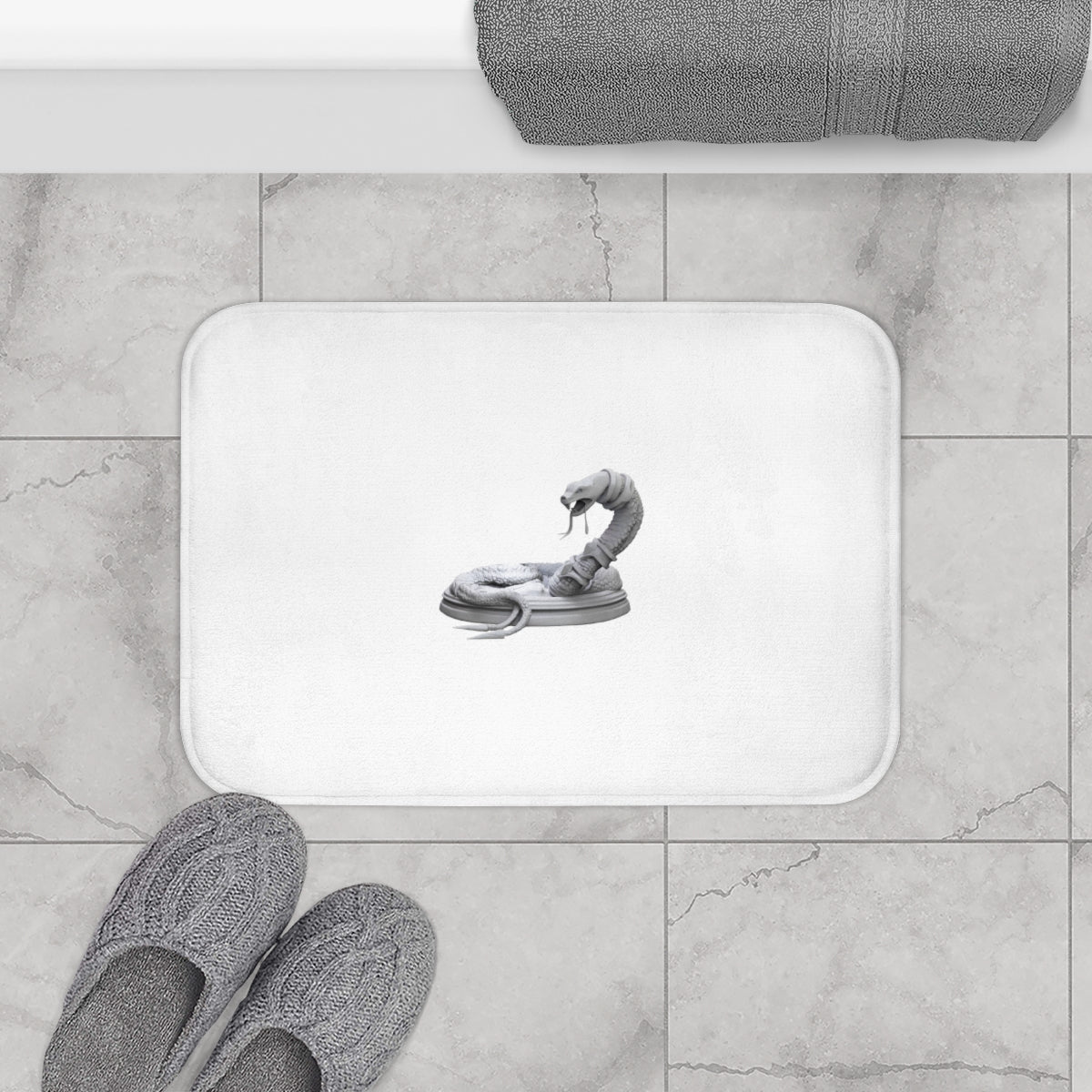 A stylish snake-themed bath mat with anti-slip backing, showcasing its soft microfiber texture and vibrant design.