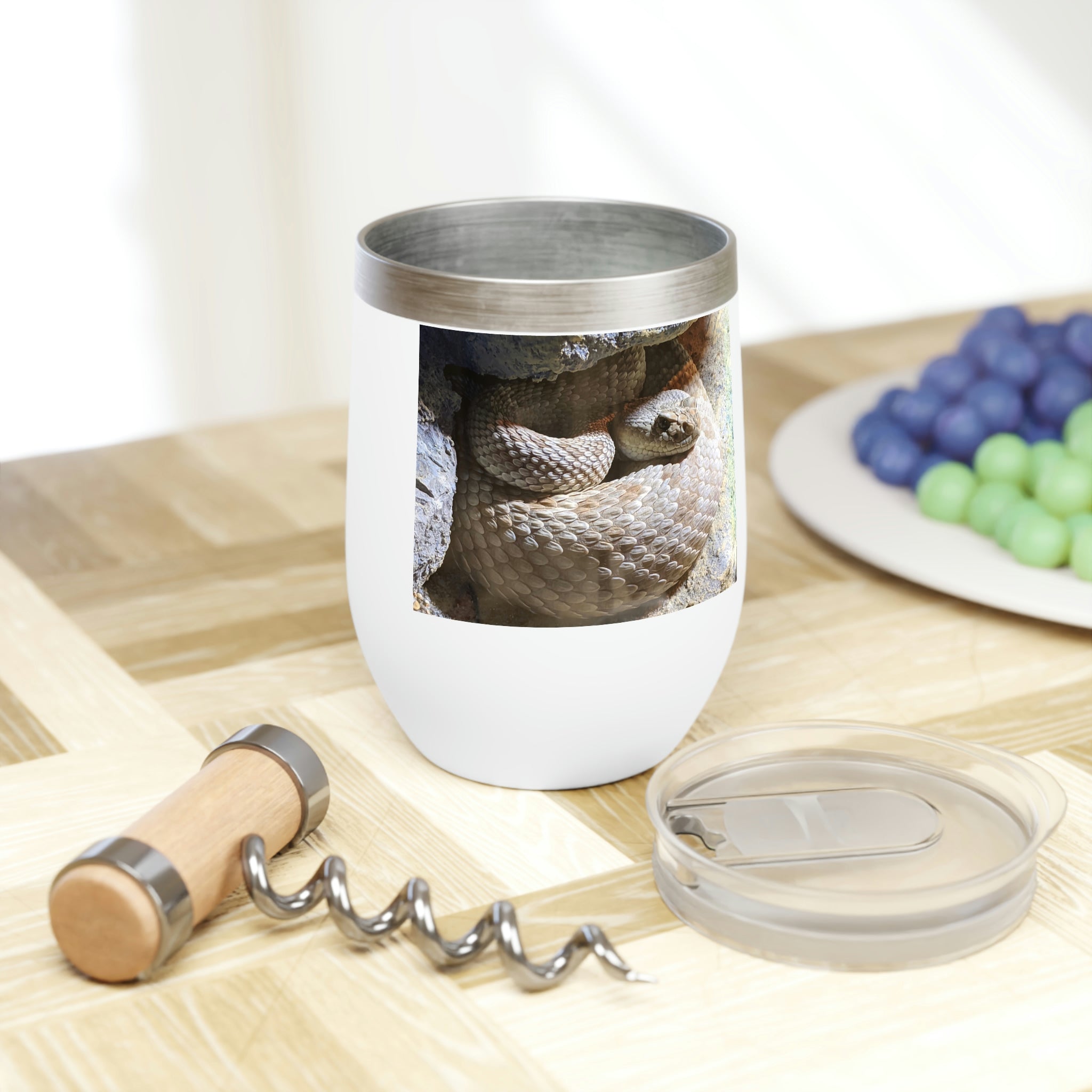 A stylish Snake Chill Wine Tumbler made of stainless steel, featuring a double-insulated design for temperature retention and customizable options.