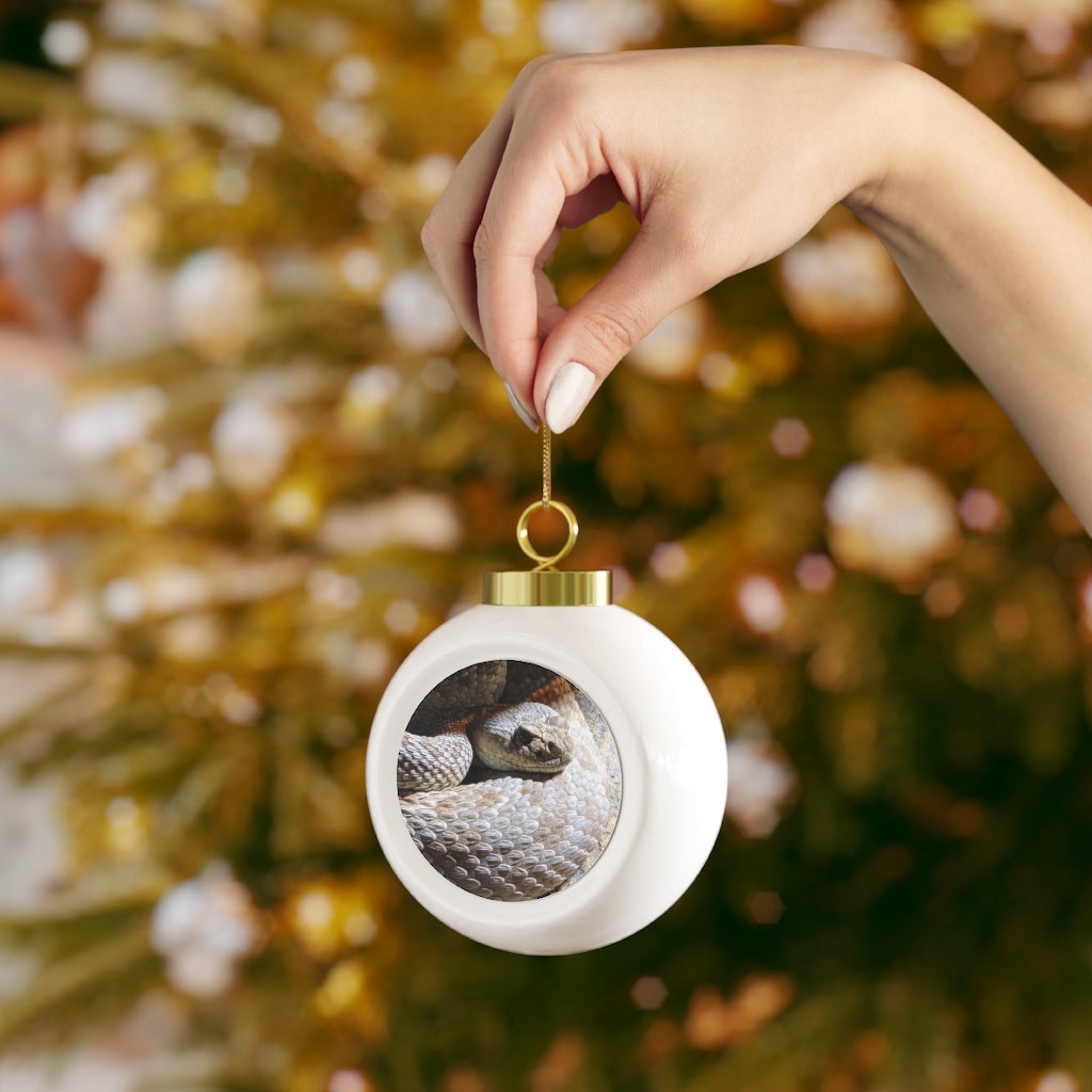 A 3-inch glossy Snake Christmas Ball Ornament with a gold ribbon, featuring a vintage design and customizable metal insert.