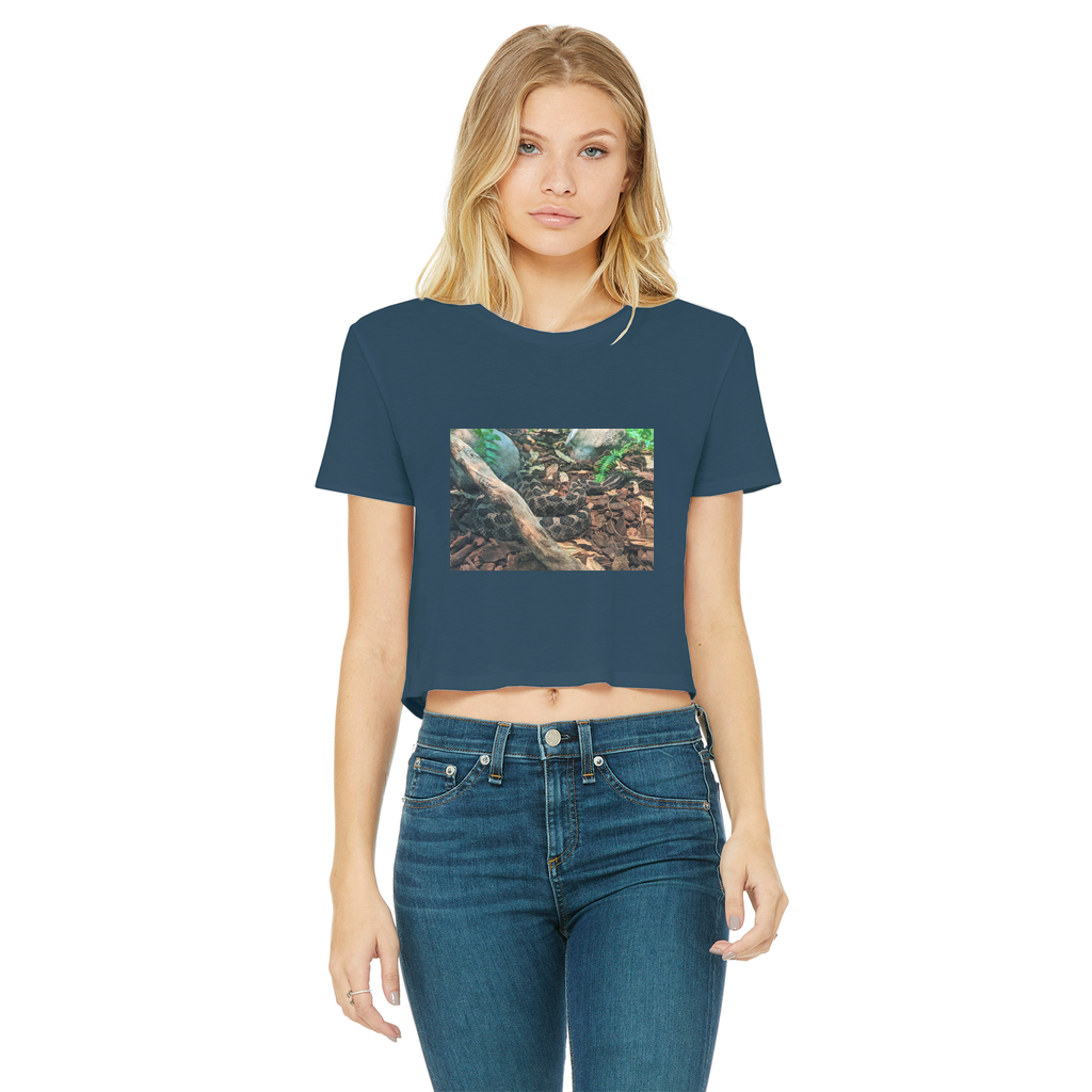 A stylish Snake Classic Women's Cropped Raw Edge T-Shirt featuring a round neck, short sleeves, and a trendy raw edge cut hem, made from soft cotton.