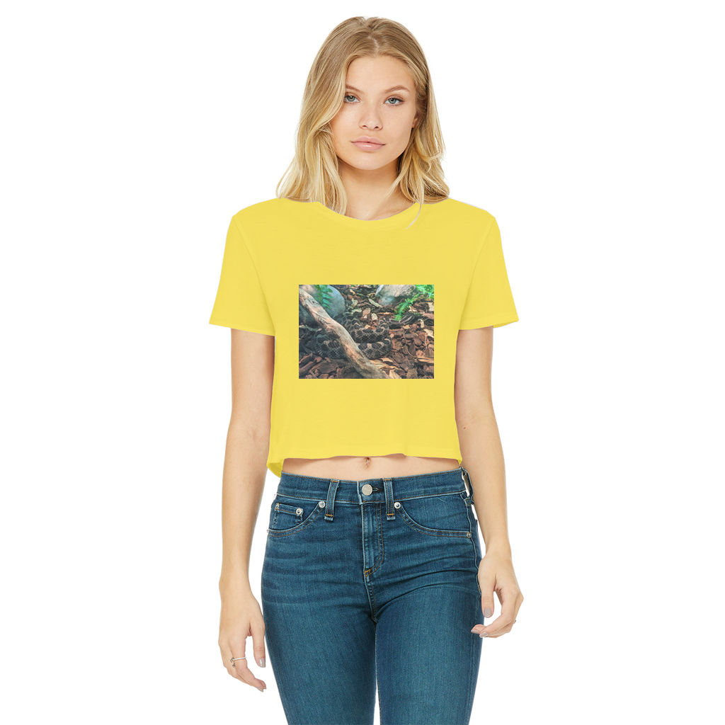 A stylish Snake Classic Women's Cropped Raw Edge T-Shirt featuring a round neck, short sleeves, and a trendy raw edge cut hem, made from soft cotton.