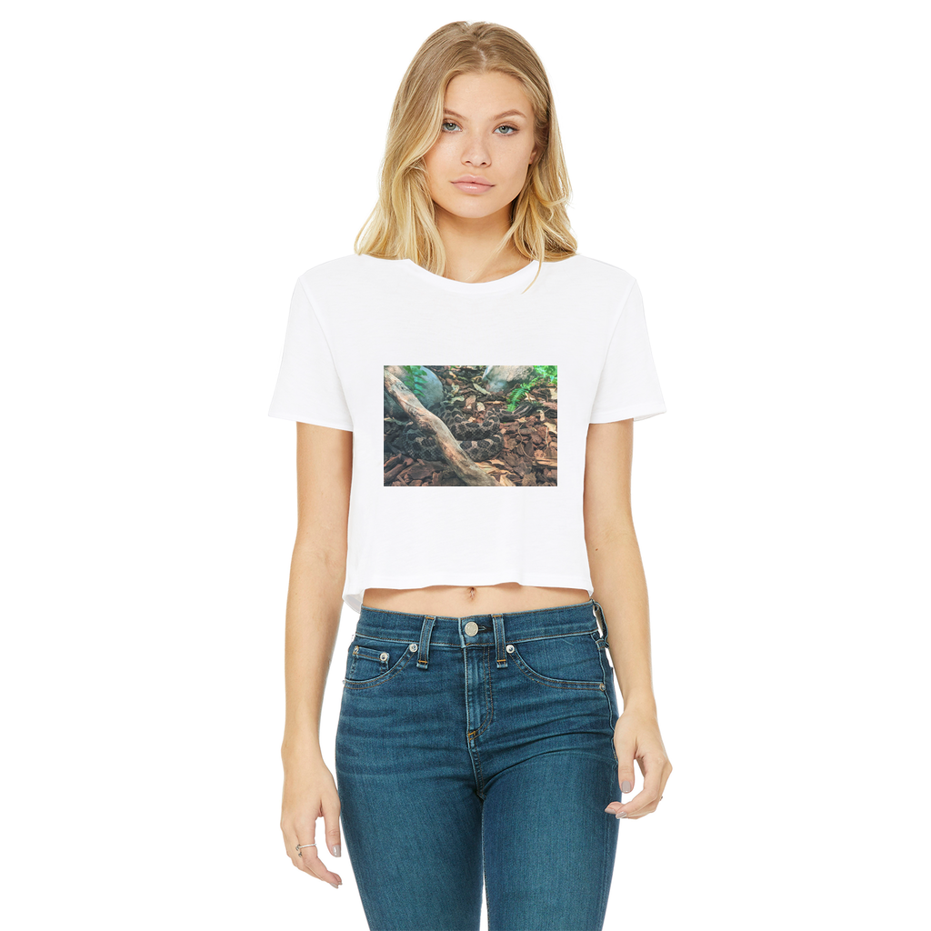 A stylish Snake Classic Women's Cropped Raw Edge T-Shirt featuring a round neck, short sleeves, and a trendy raw edge cut hem, made from soft cotton.