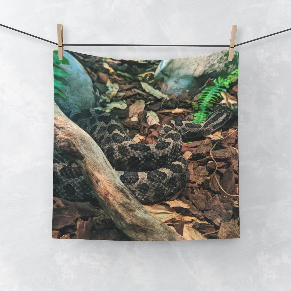 A vibrant Snake Face Towel featuring a customizable polyester front and soft cotton back, ideal for bathroom use.