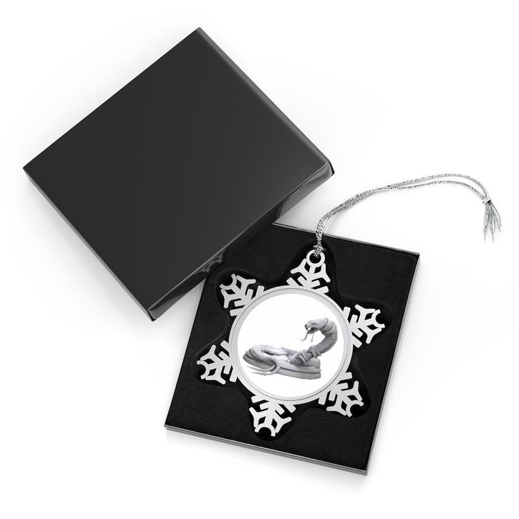 A beautifully crafted Snake Pewter Snowflake Ornament with intricate details and a silver-toned hanging string, perfect for holiday decor.