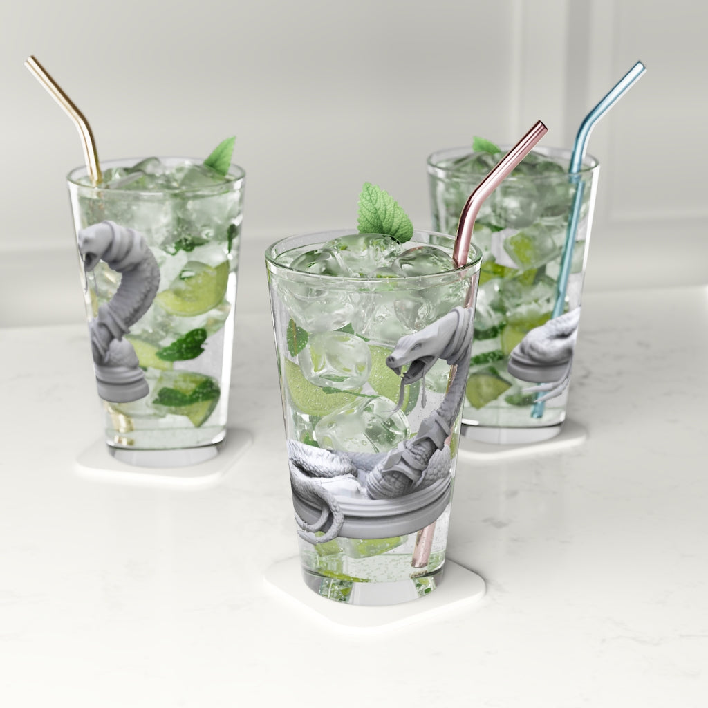 A clear 16oz Snake Pint Glass showcasing its sleek design and customizable features.