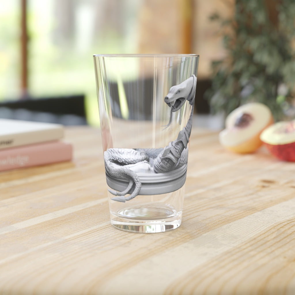 A clear 16oz Snake Pint Glass showcasing its sleek design and customizable features.