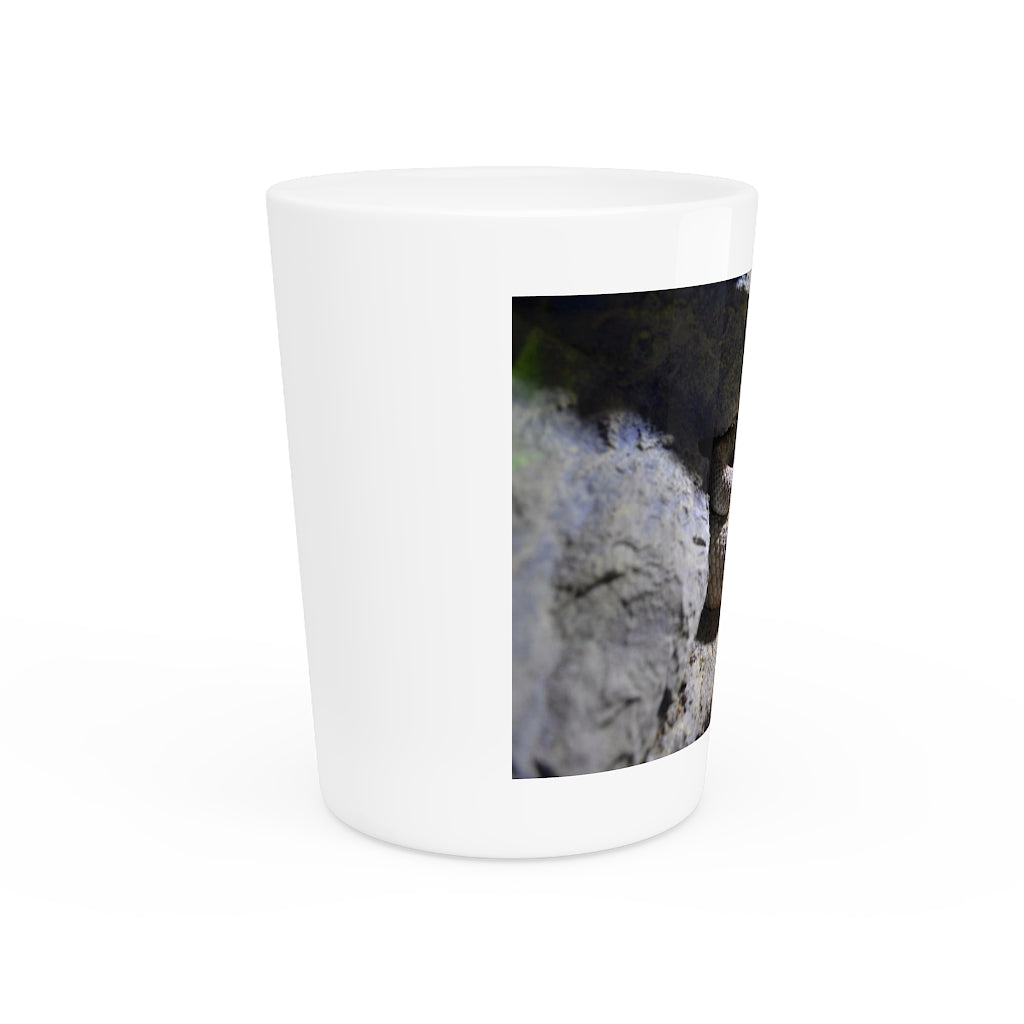 A personalized Snake Shot Glass made of white ceramic with a customizable design, featuring a black interior.