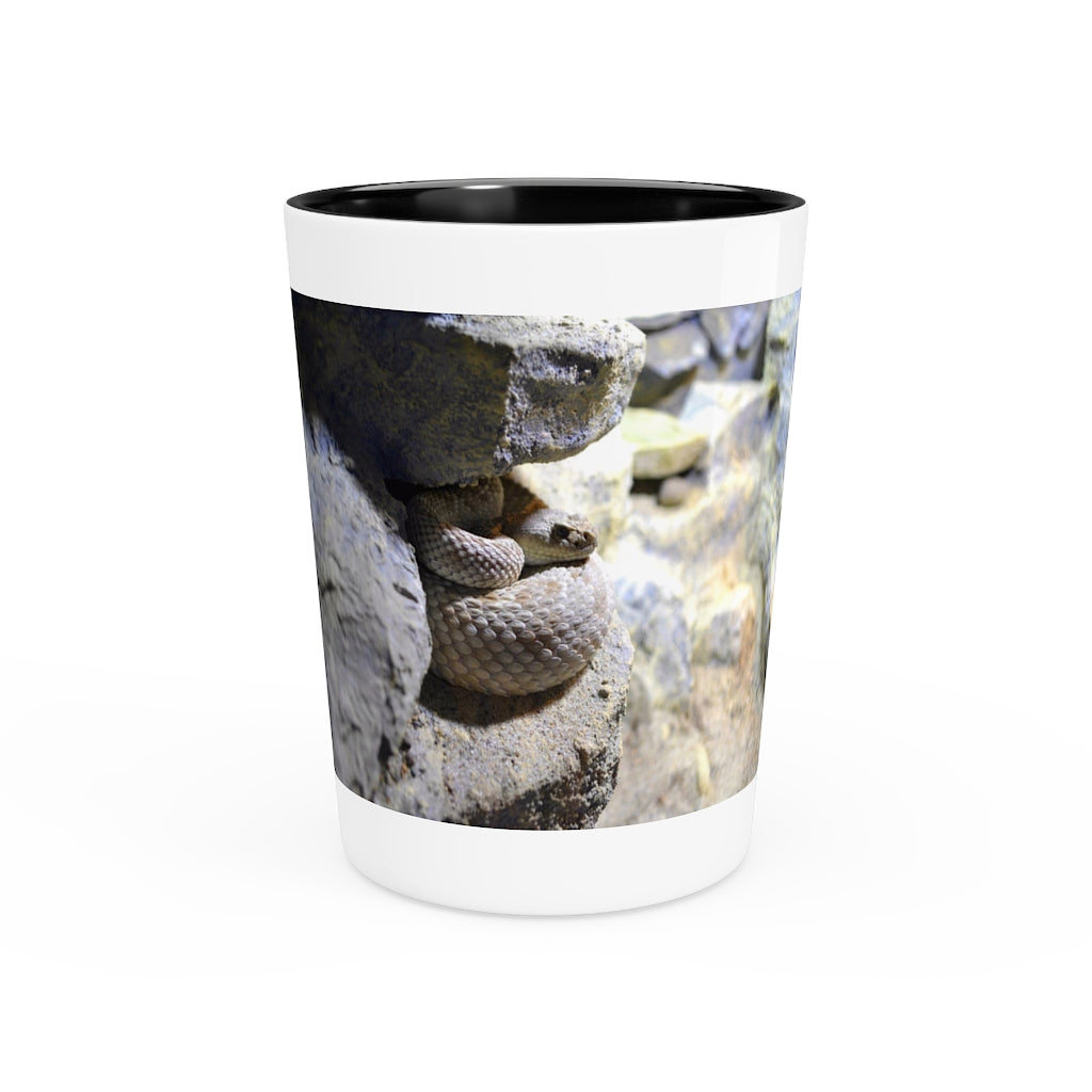 A personalized Snake Shot Glass made of white ceramic with a customizable design, featuring a black interior.