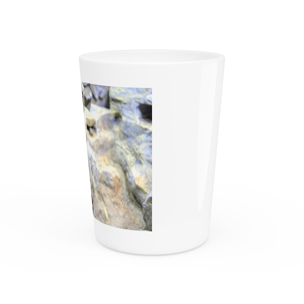 A personalized Snake Shot Glass made of white ceramic with a customizable design, featuring a black interior.