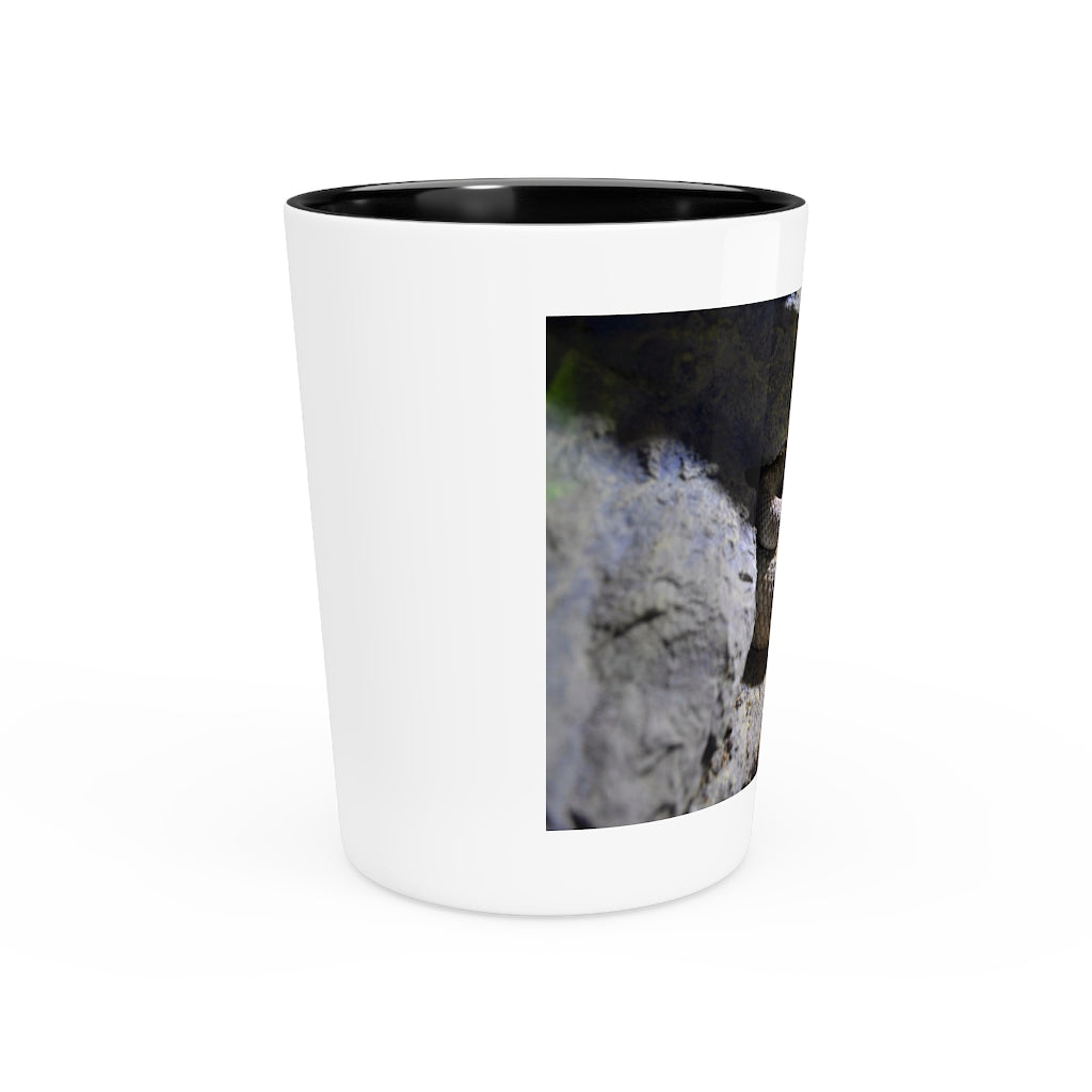 A personalized Snake Shot Glass made of white ceramic with a customizable design, featuring a black interior.