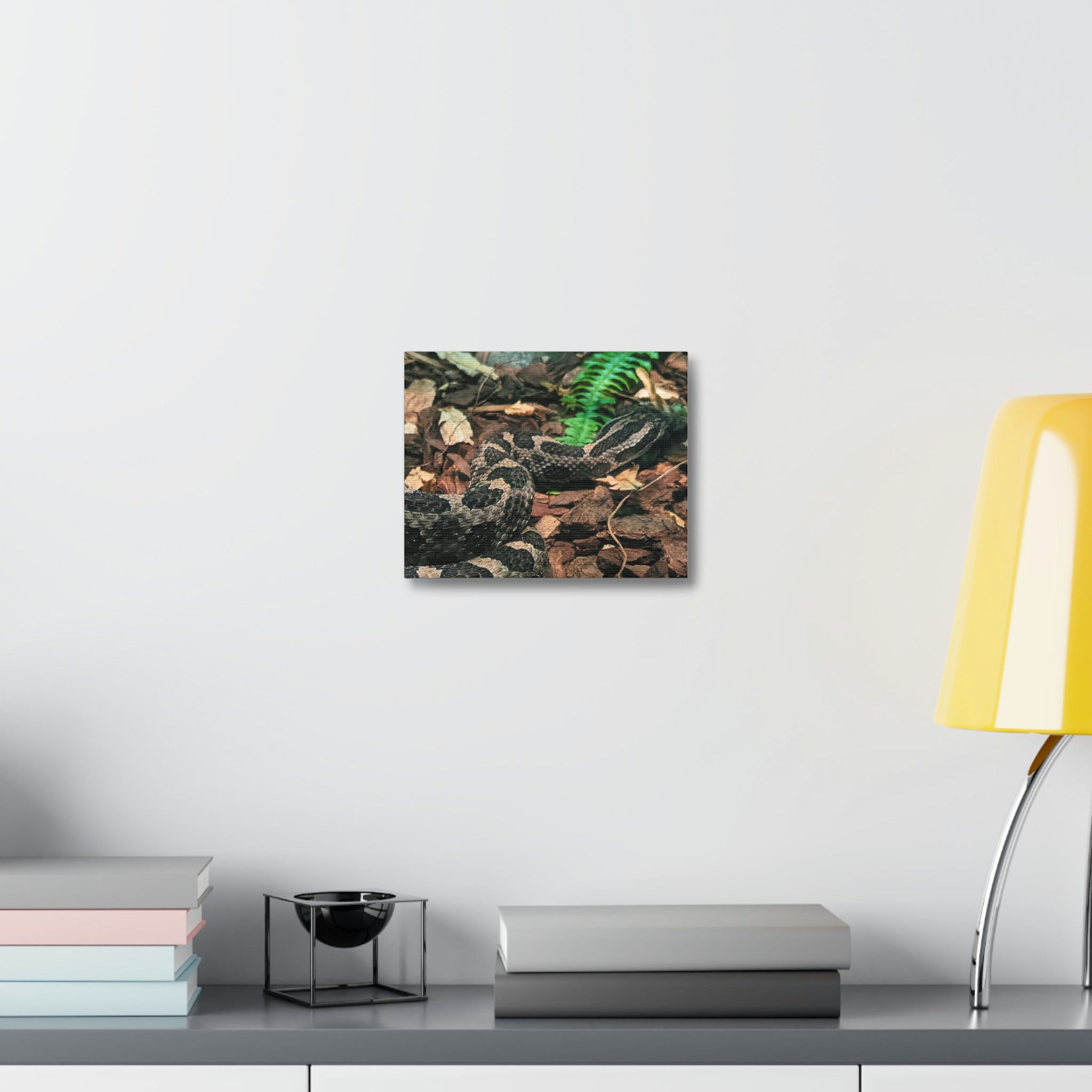 A beautifully designed Snake Stretched Canvas art piece, showcasing vibrant colors and intricate details, mounted on a sturdy wooden frame.