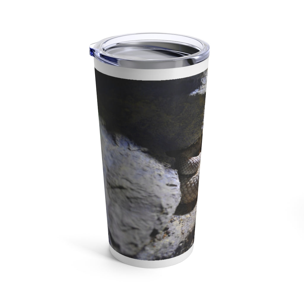 A sleek stainless steel Snake Tumbler 20oz with a see-thru plastic lid, showcasing its stylish design and durable construction.