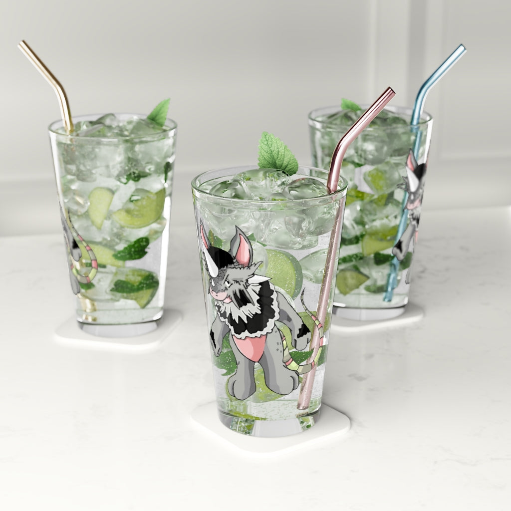 A clear 16oz Snibble Pint Glass showcasing a customizable design, perfect for beverages.