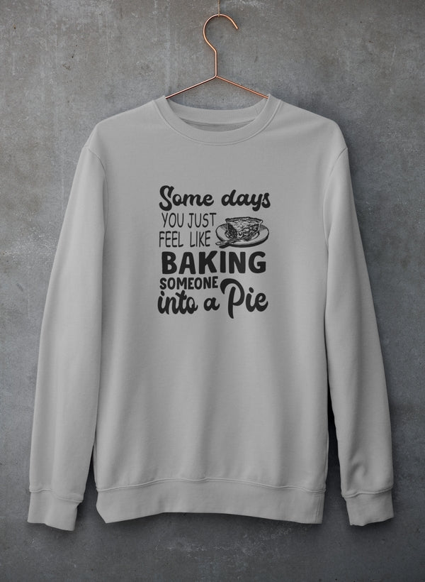 Cozy sweatshirt featuring a humorous baking design, made from soft cotton/poly fleece blend.