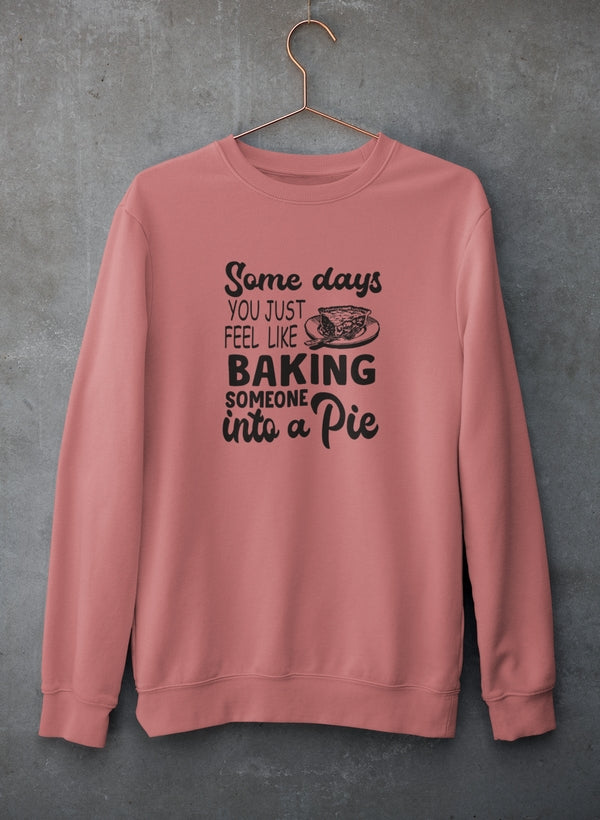 Cozy sweatshirt featuring a humorous baking design, made from soft cotton/poly fleece blend.