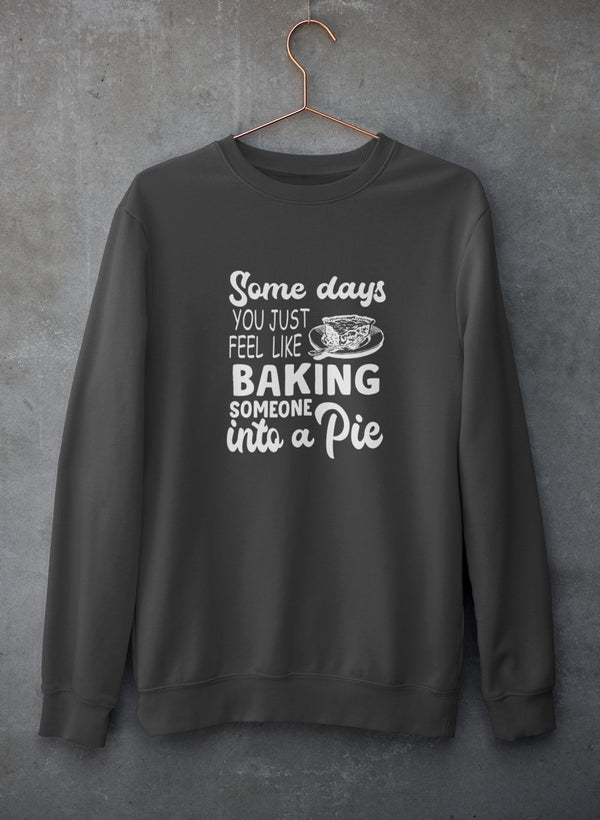 Cozy sweatshirt featuring a humorous baking design, made from soft cotton/poly fleece blend.