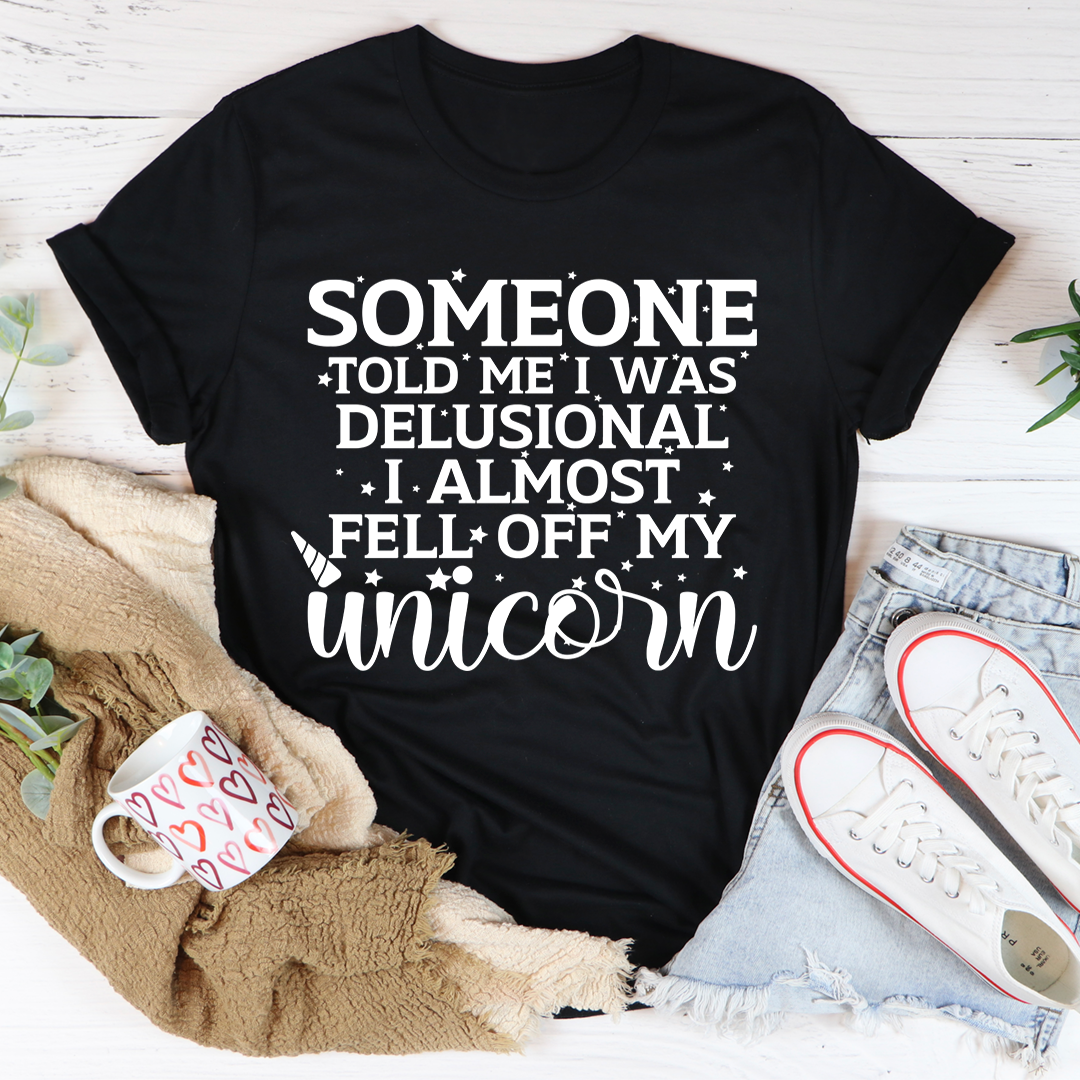 Someone Told Me I Was Delusional T-Shirt displayed on a mannequin, showcasing its soft cotton fabric and humorous design.