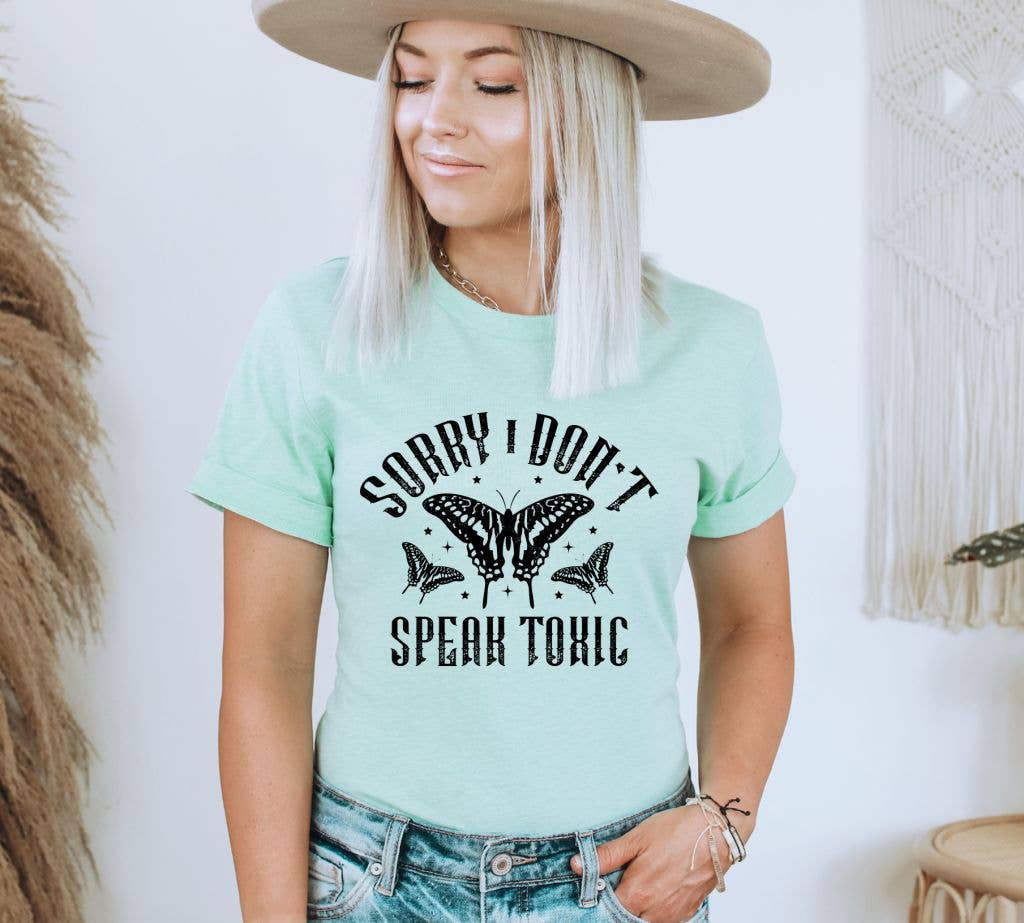 Sorry I Don't Speak Toxic T-shirt made of premium ring spun cotton with a bold print, available in various sizes.