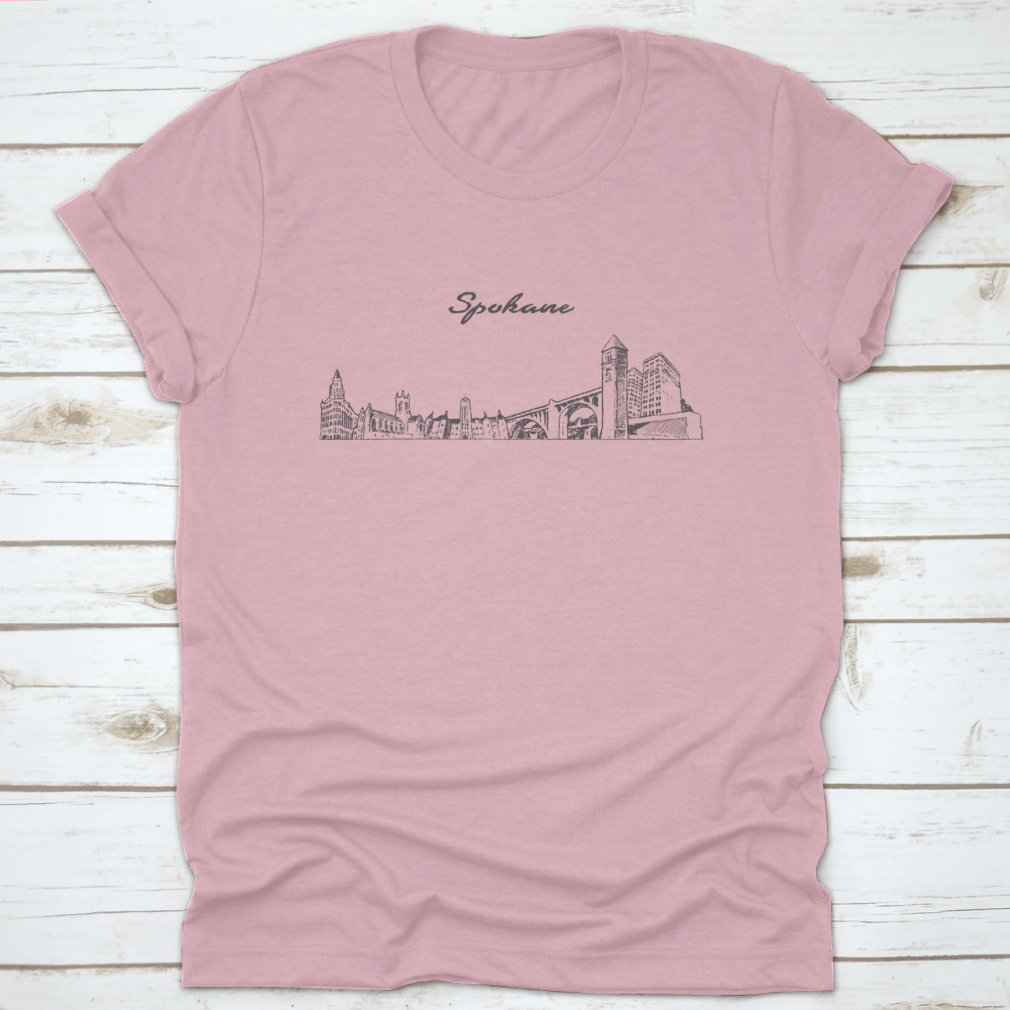 Hand-drawn vector design of Spokane skyline on a comfortable cotton t-shirt, showcasing the city's iconic buildings.