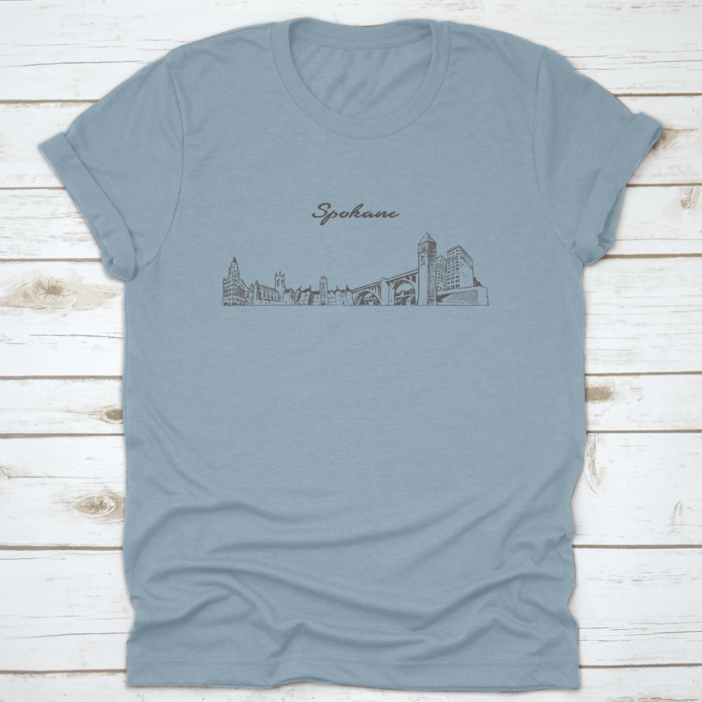 Hand-drawn vector design of Spokane skyline on a comfortable cotton t-shirt, showcasing the city's iconic buildings.