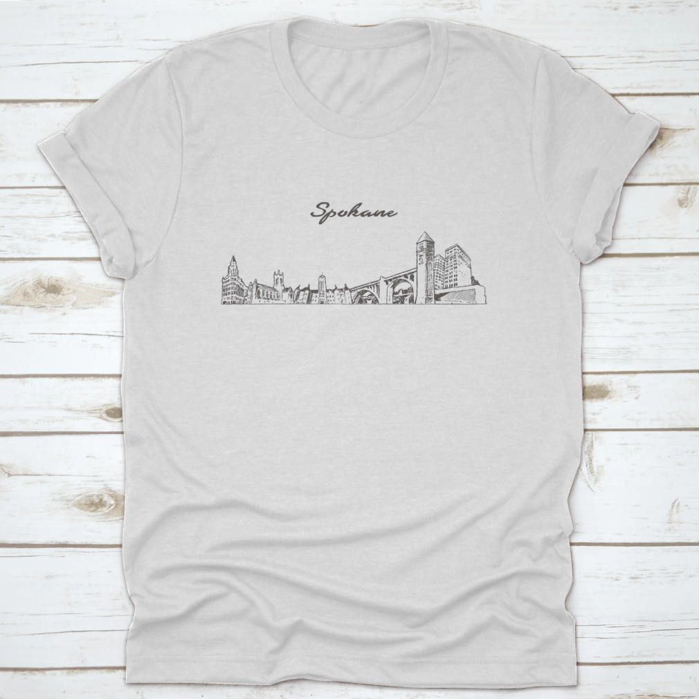 Hand-drawn vector design of Spokane skyline on a comfortable cotton t-shirt, showcasing the city's iconic buildings.