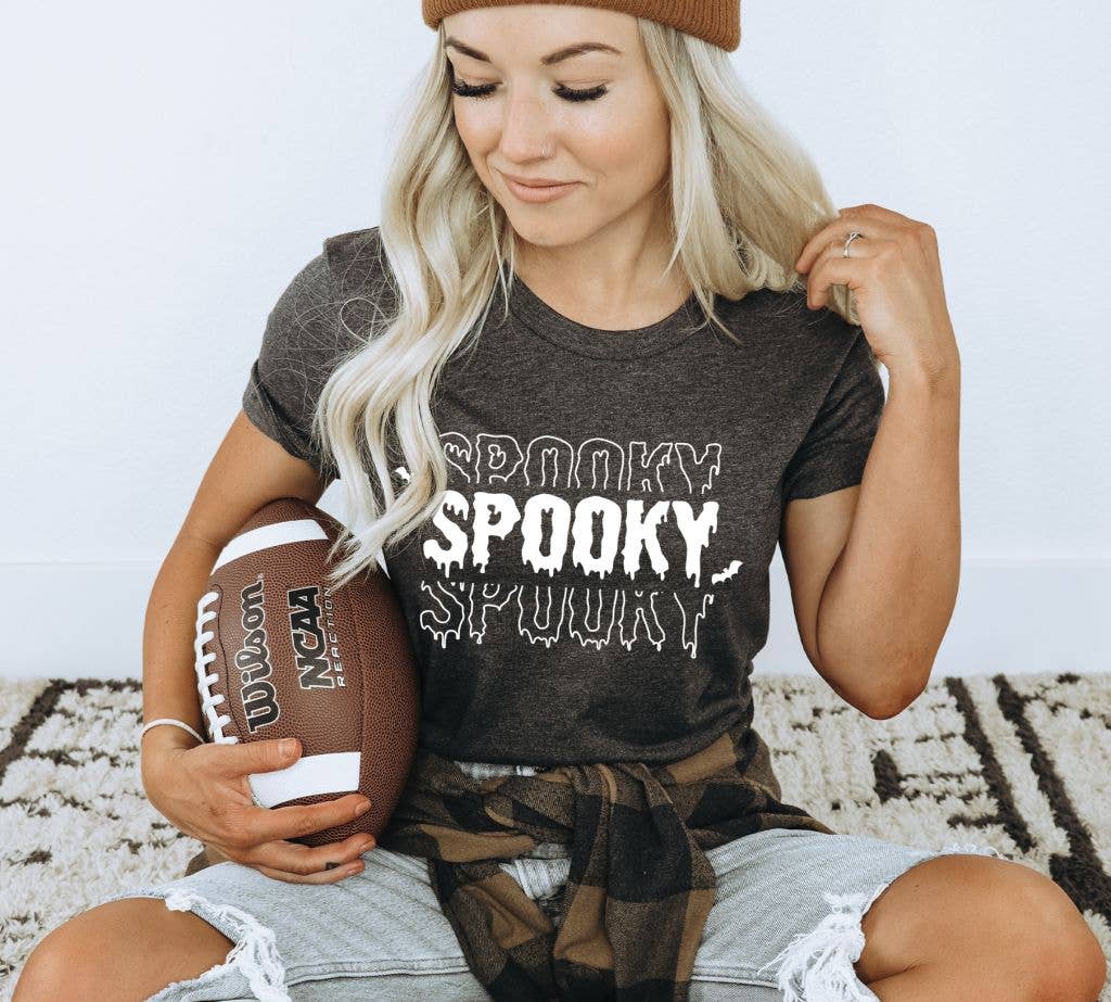 A stylish Spooky T-shirt made of premium ring spun cotton featuring a vibrant Halloween-themed design.