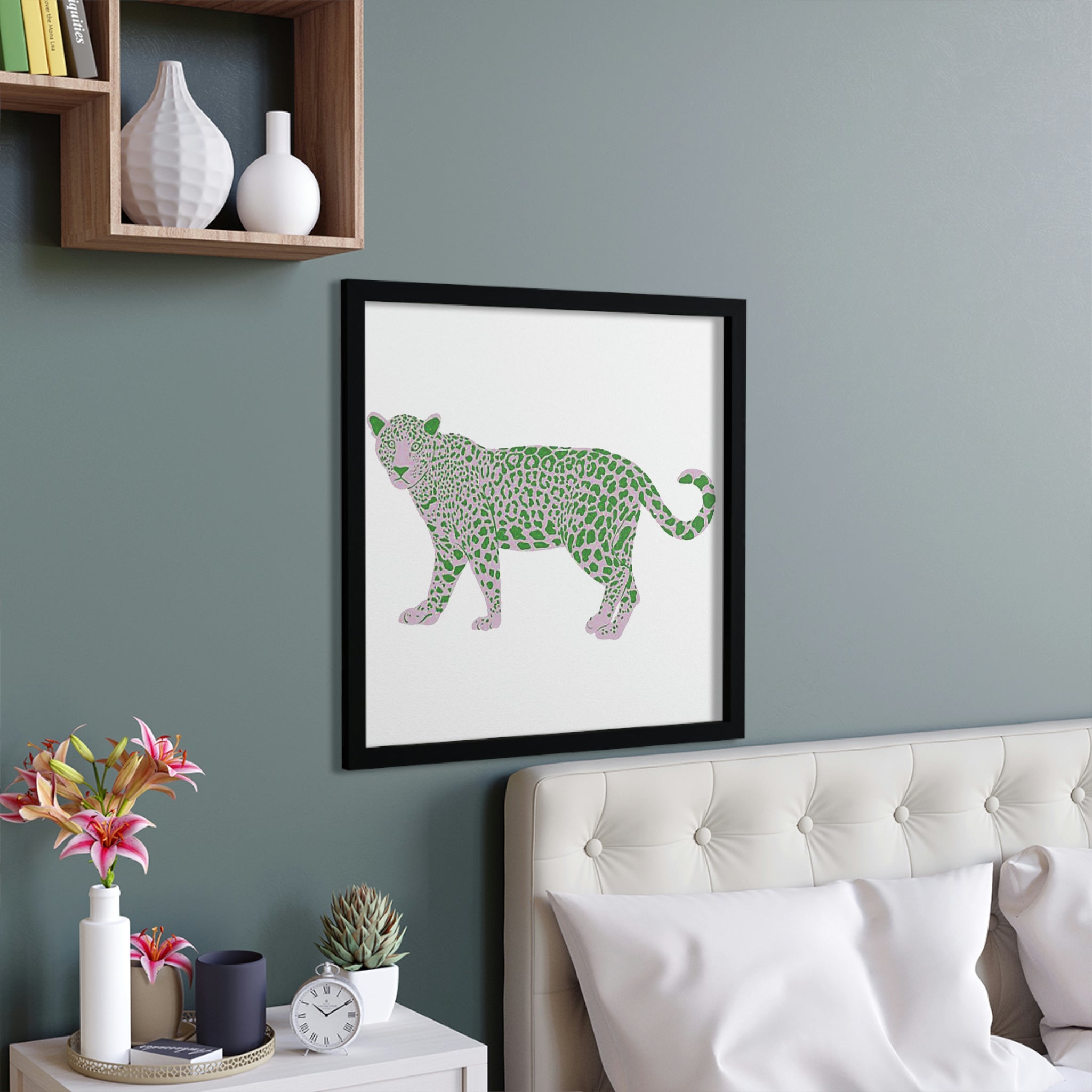 A beautifully framed poster of a spotted leopard, showcasing vibrant colors and intricate details, set in a hand-crafted wooden frame.