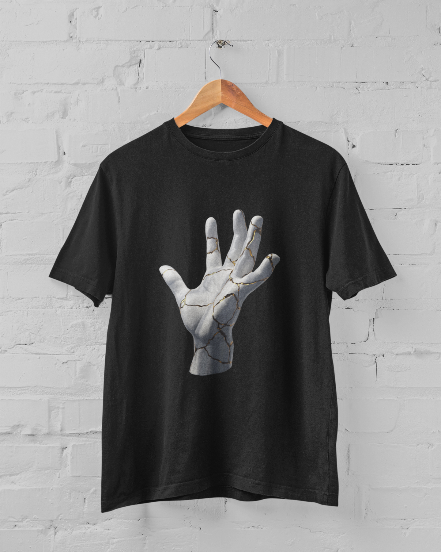 Stone hand unisex t-shirt made of durable cotton, featuring rolled-forward shoulders and fitted sleeves.