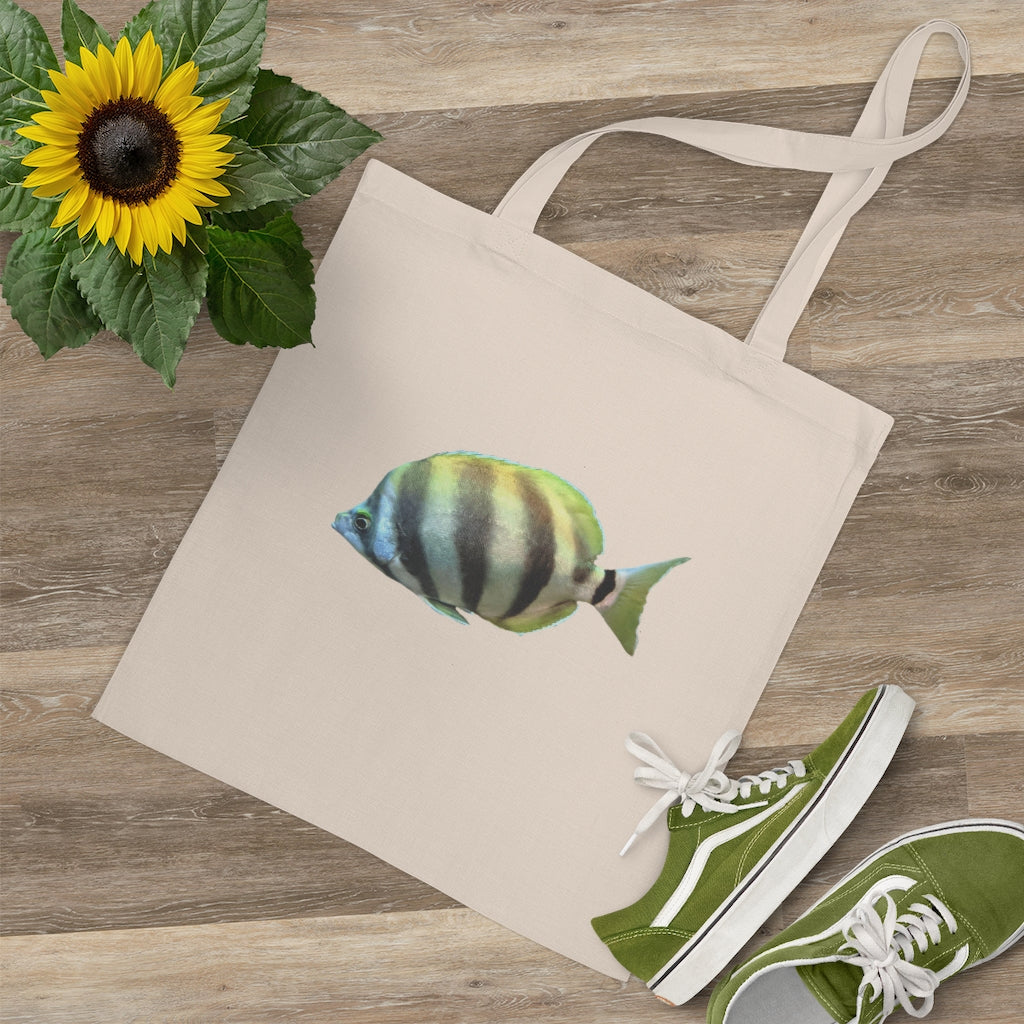 A colorful striped fish tote bag made of 100% cotton with long handles and cross stitching for durability.