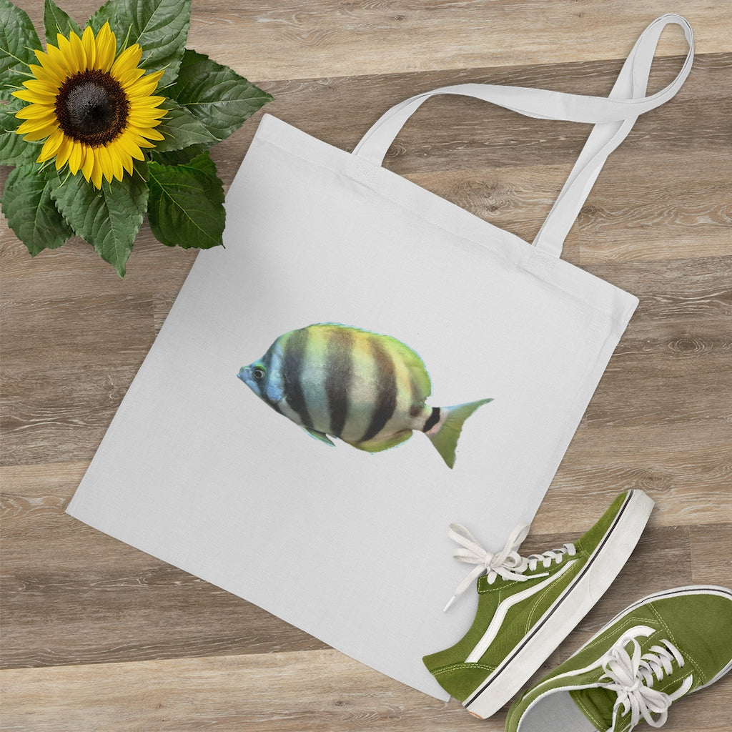 A colorful striped fish tote bag made of 100% cotton with long handles and cross stitching for durability.