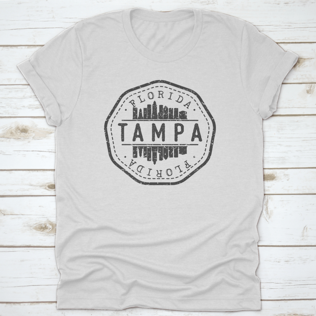 Tampa, FL USA Stamp Skyline Postmark T-shirt featuring a round vector icon of the city skyline on a soft cotton fabric.