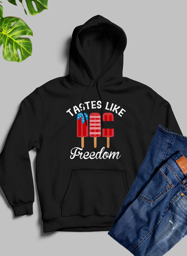 A stylish Tastes Like Freedom Hoodie featuring unique artistic designs, made from cozy fleece blend material with an adjustable hood.