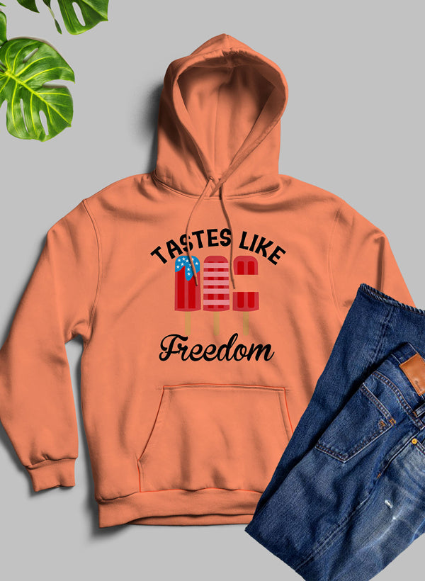 A stylish Tastes Like Freedom Hoodie featuring unique artistic designs, made from cozy fleece blend material with an adjustable hood.